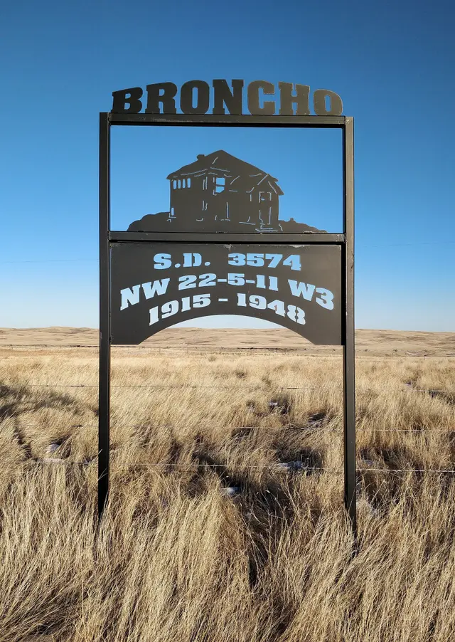 Broncho School District memorial sign