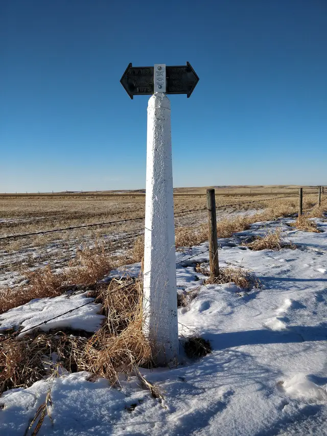 NWMP trail marker on the prairie
